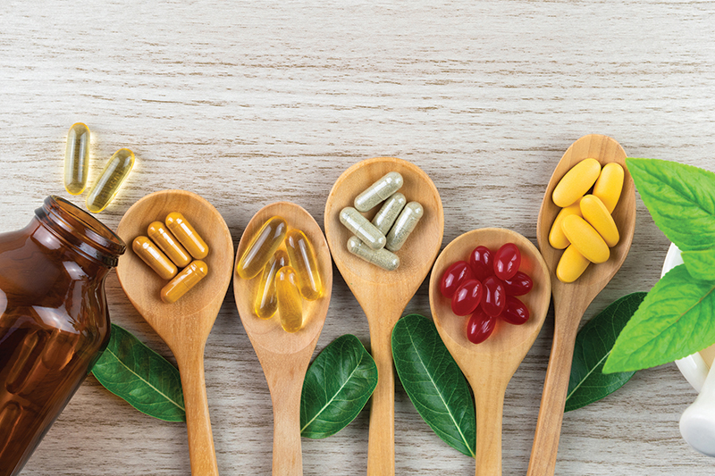 Supplements in wooden spoons